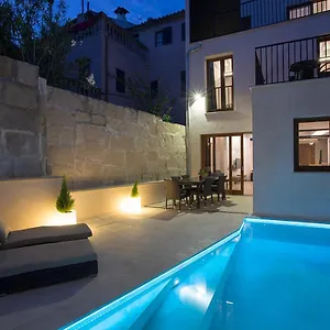 https://antigua-casa-de-pueblo-sant-sebastia.allmallorcahotels.com